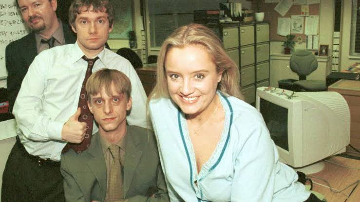 Lucy Davis, who played Dawn Tinsley in The Office, smiling in a portrait photo
